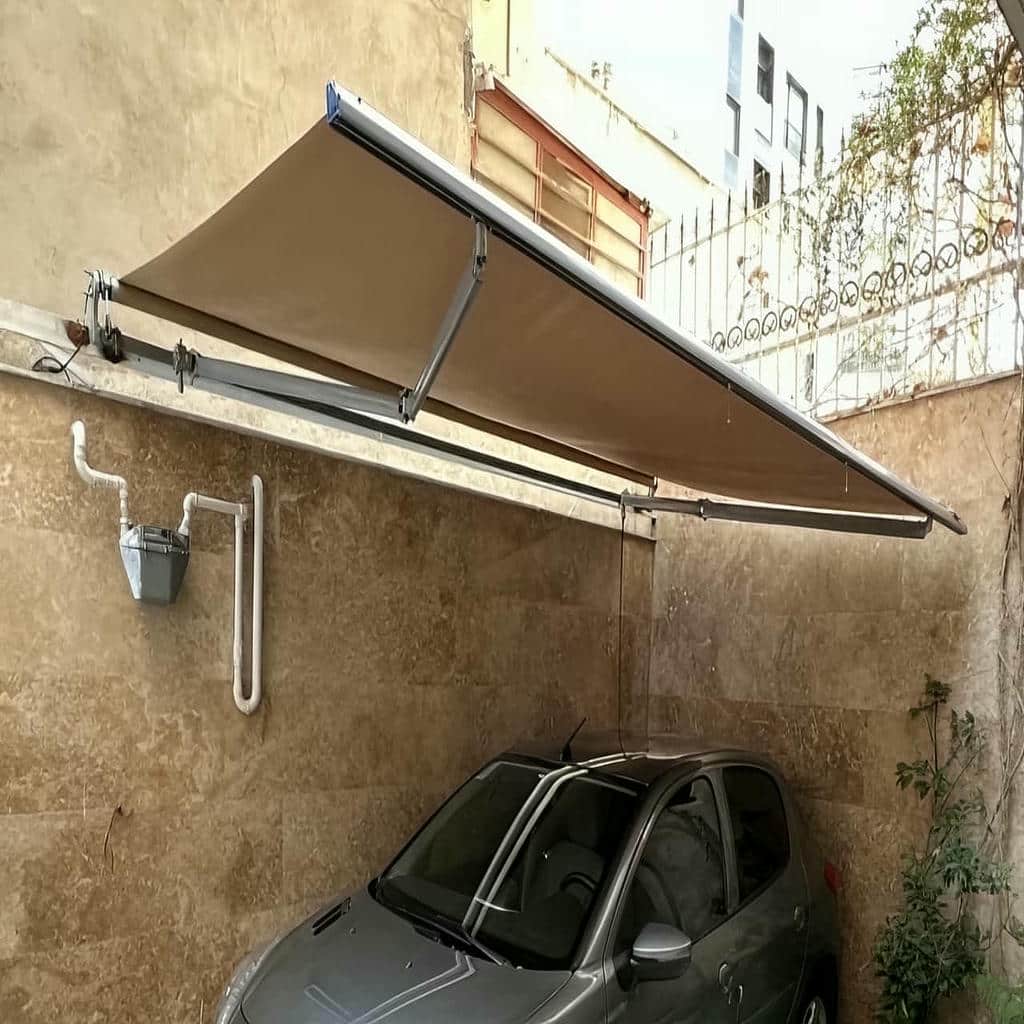 نصب سایبان برقی بازویی ضدآب در باغ عباسآباد