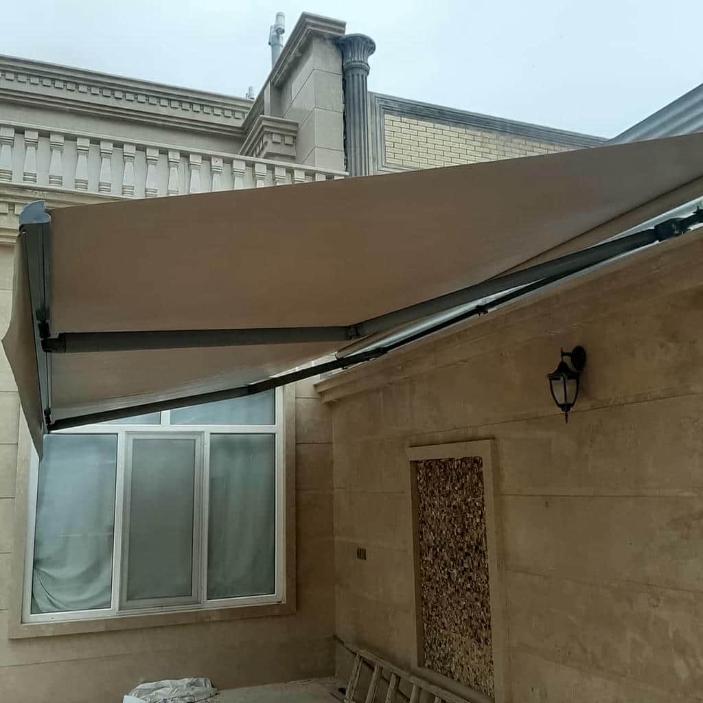 نصب سایبان برقی بازویی اتوماتیک پارچه ضدآب در کیش