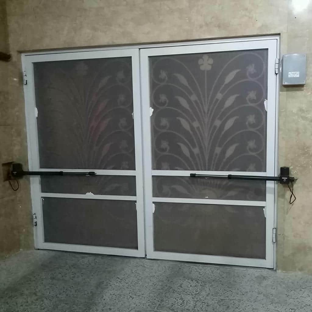 نصب جک درب پارکینگ اتوماتیک دهانه در پردیس