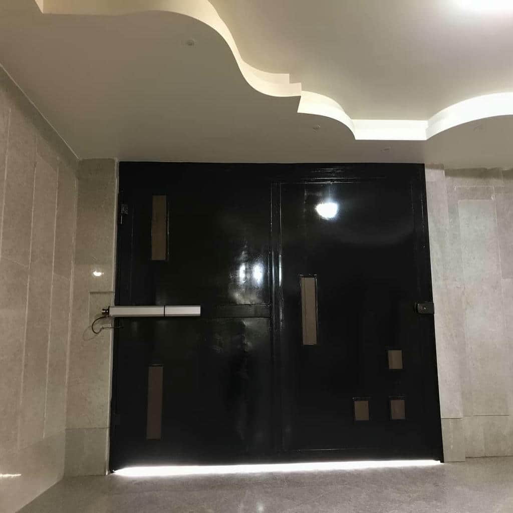 نصب جک درب پارکینگ اتوماتیک لولایی در ارومیه