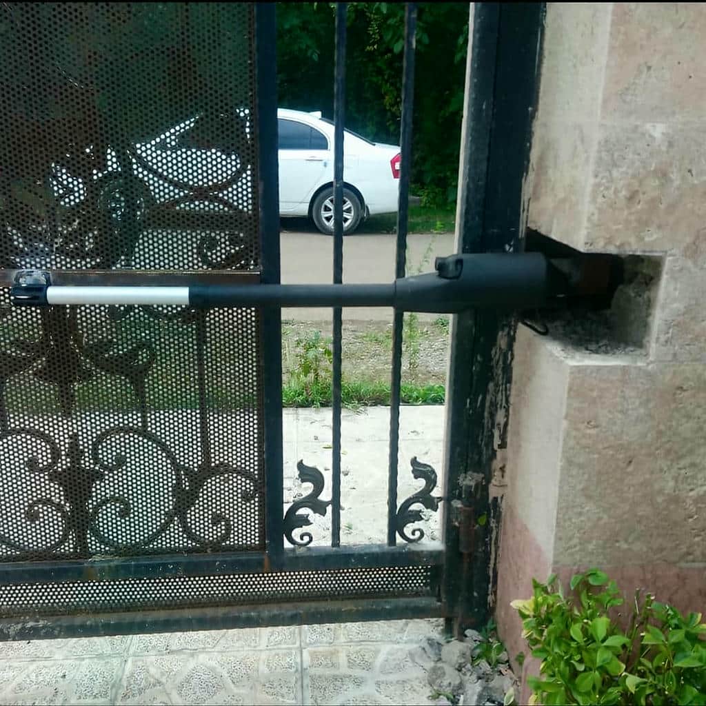 نصب جک درب پارکینگ اتوماتیک لولایی در گرگان