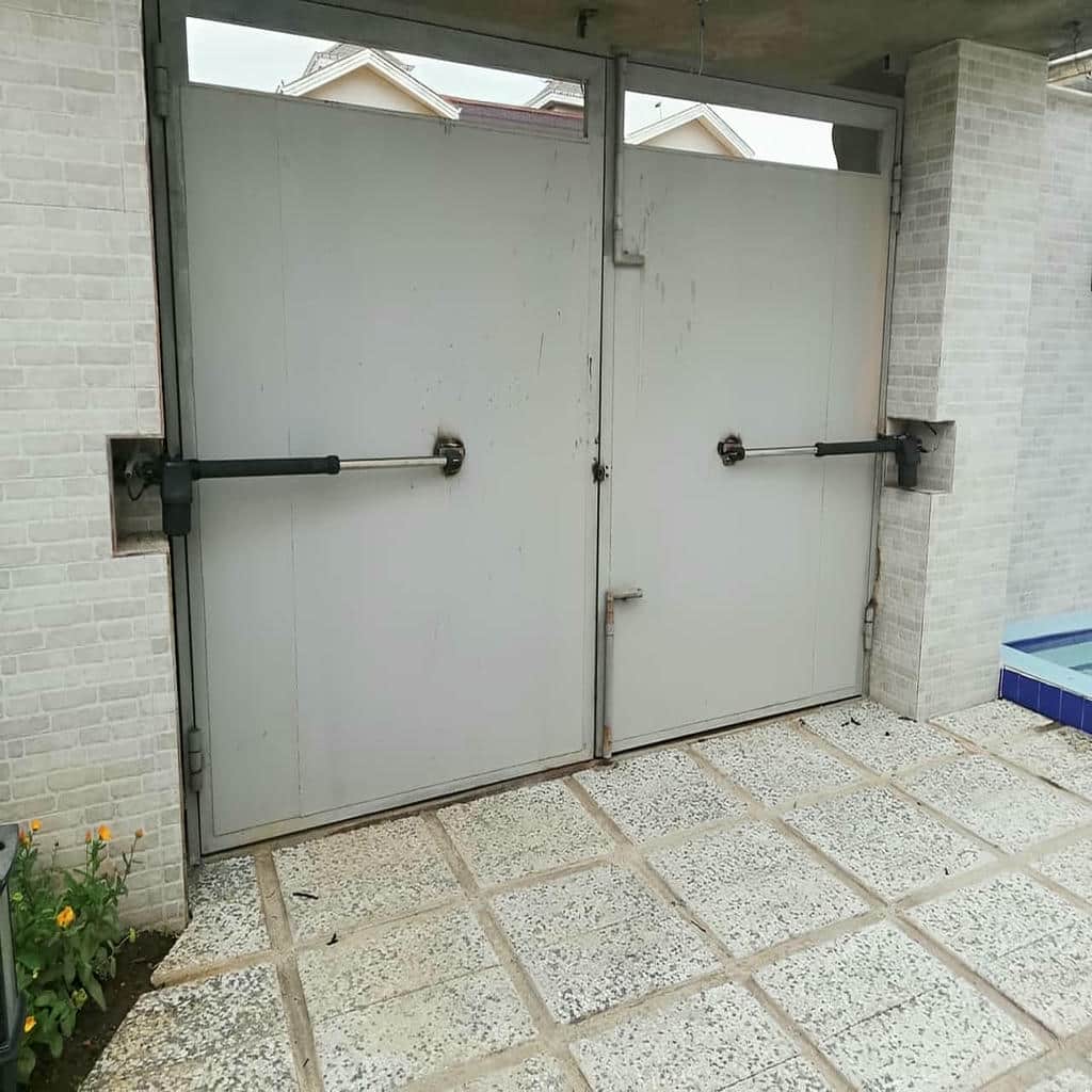 جک درب پارکینگ با گیربکس مقاوم و حرکت نرم جک درب پارکینگ با گیربکس مقاوم و حرکت نرم