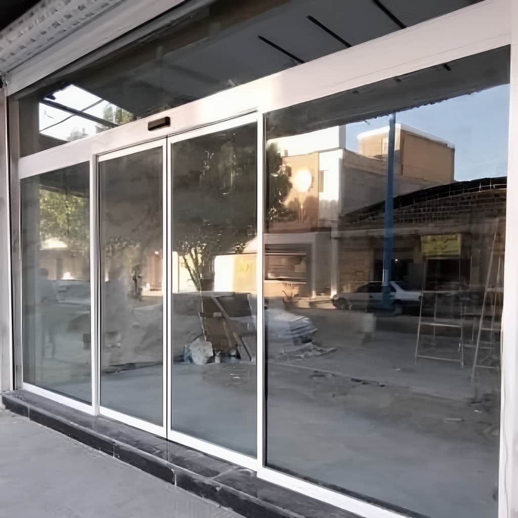 درب اتوماتیک شیشه ای فریم لس دودی