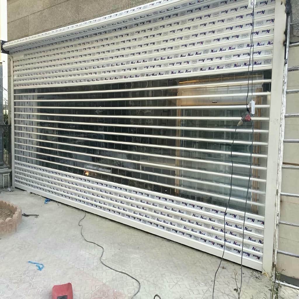 تولید درب کرکره ای پارکینگ اتوماتیک پانچ دار تولید درب کرکره ای پارکینگ اتوماتیک پانچ دار