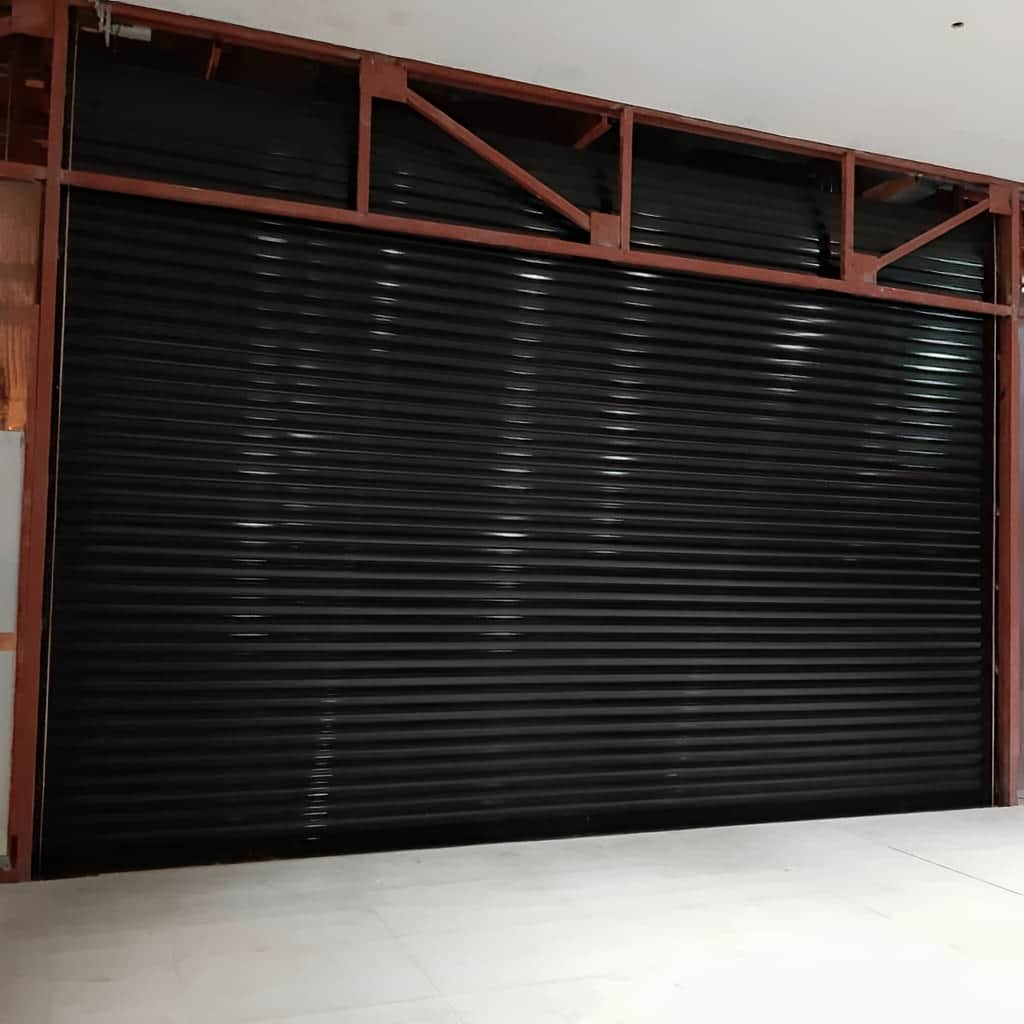 تعمیر درب کرکره ای پارکینگ اتوماتیک و رفع گیرکردن تعمیر درب کرکره ای پارکینگ اتوماتیک و رفع گیرکردن
